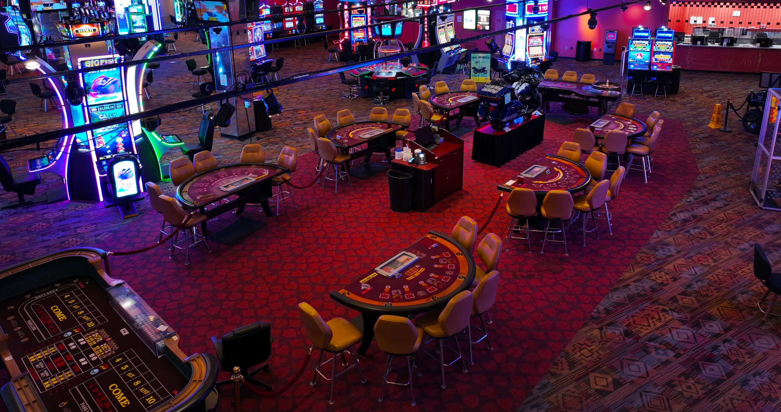 Poker and blackjack tables and Wind River Hotel Casino